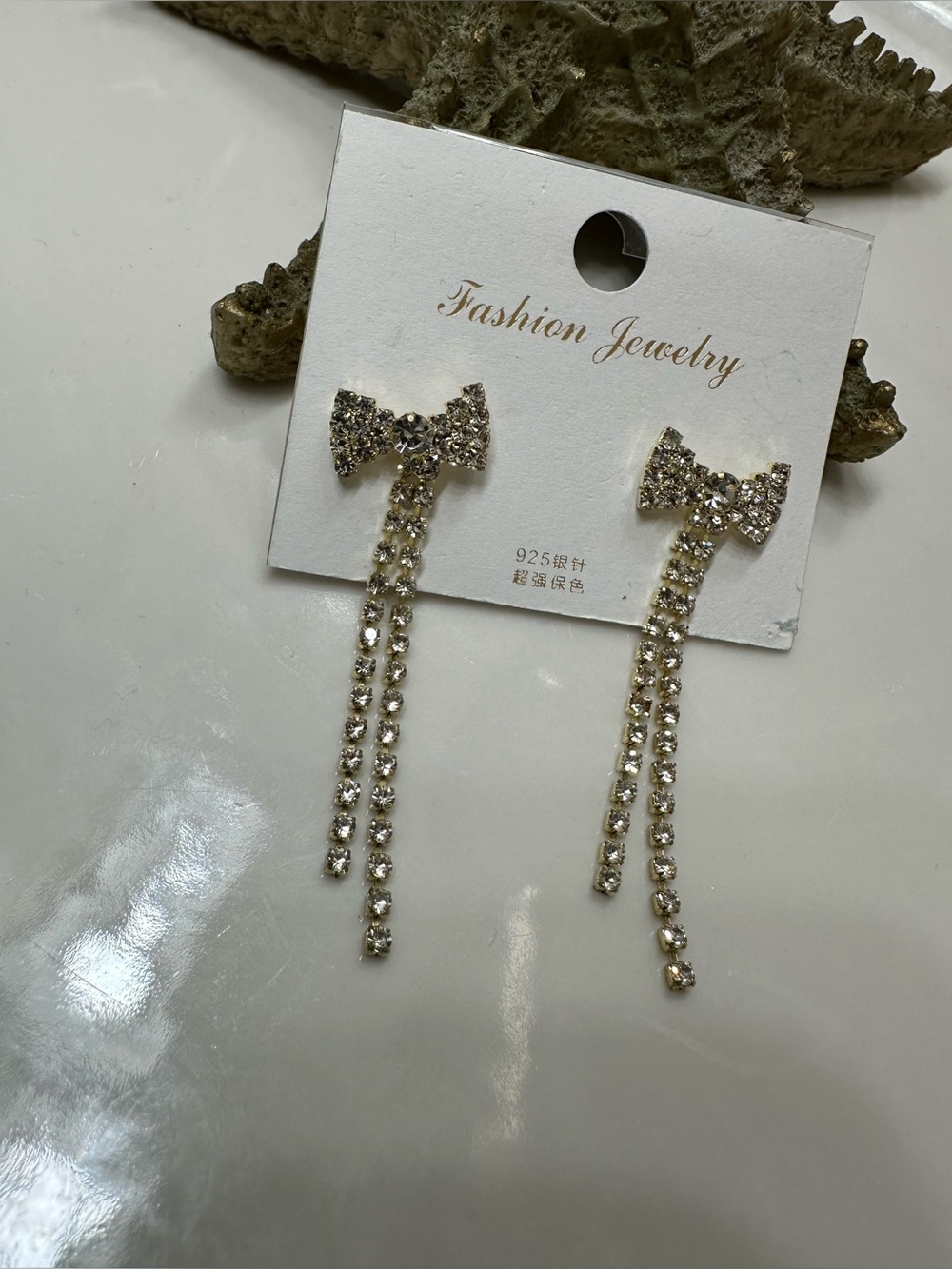 Bow earrings gold tone